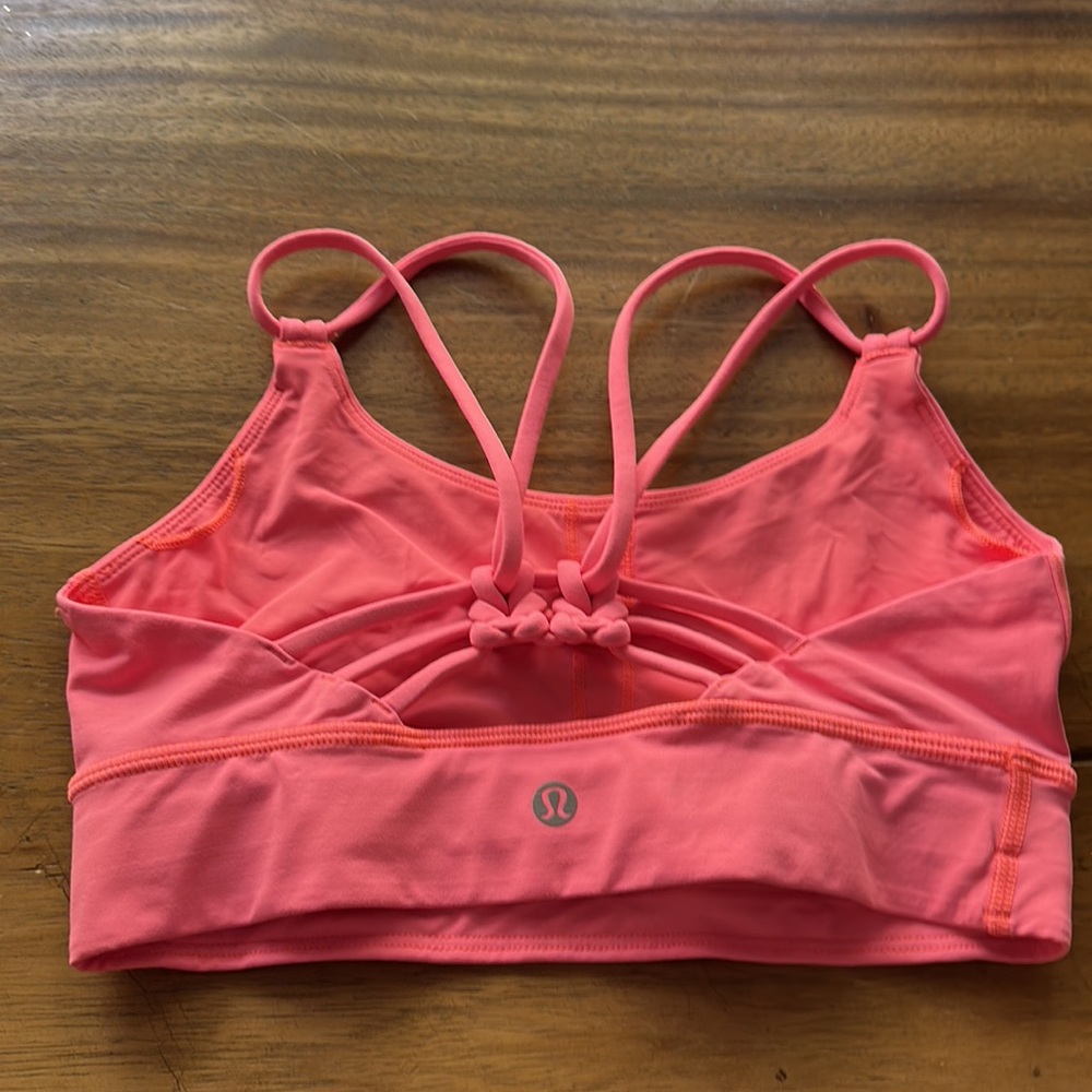 Lululemon Pink Sunshine Salutations Sports Bra. Size 4.